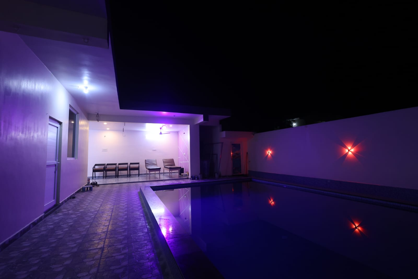 Seating area in the resort waiting hall beside the pool